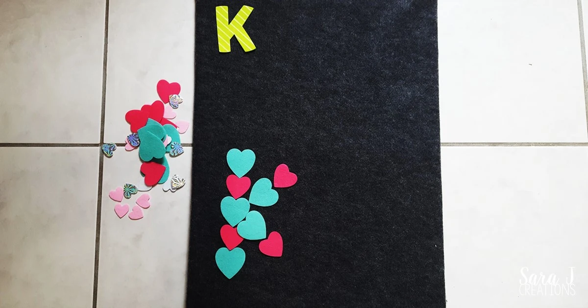 Basic math practice for toddlers and preschoolers using felt hearts to make learning fun and hands on,