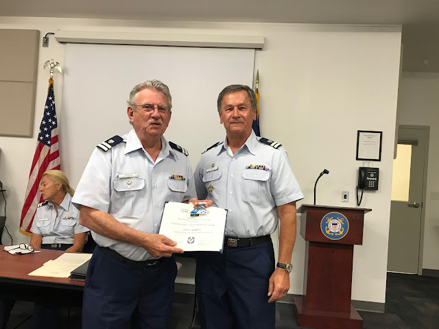 Paul Harren receives award from Bill Iwanyk.