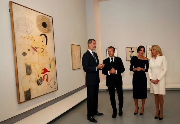 Queen Letizia wore DELPOZO flower embellished long sleeved dress. French President Emmanuel Macron and First Lady Brigitte Macron