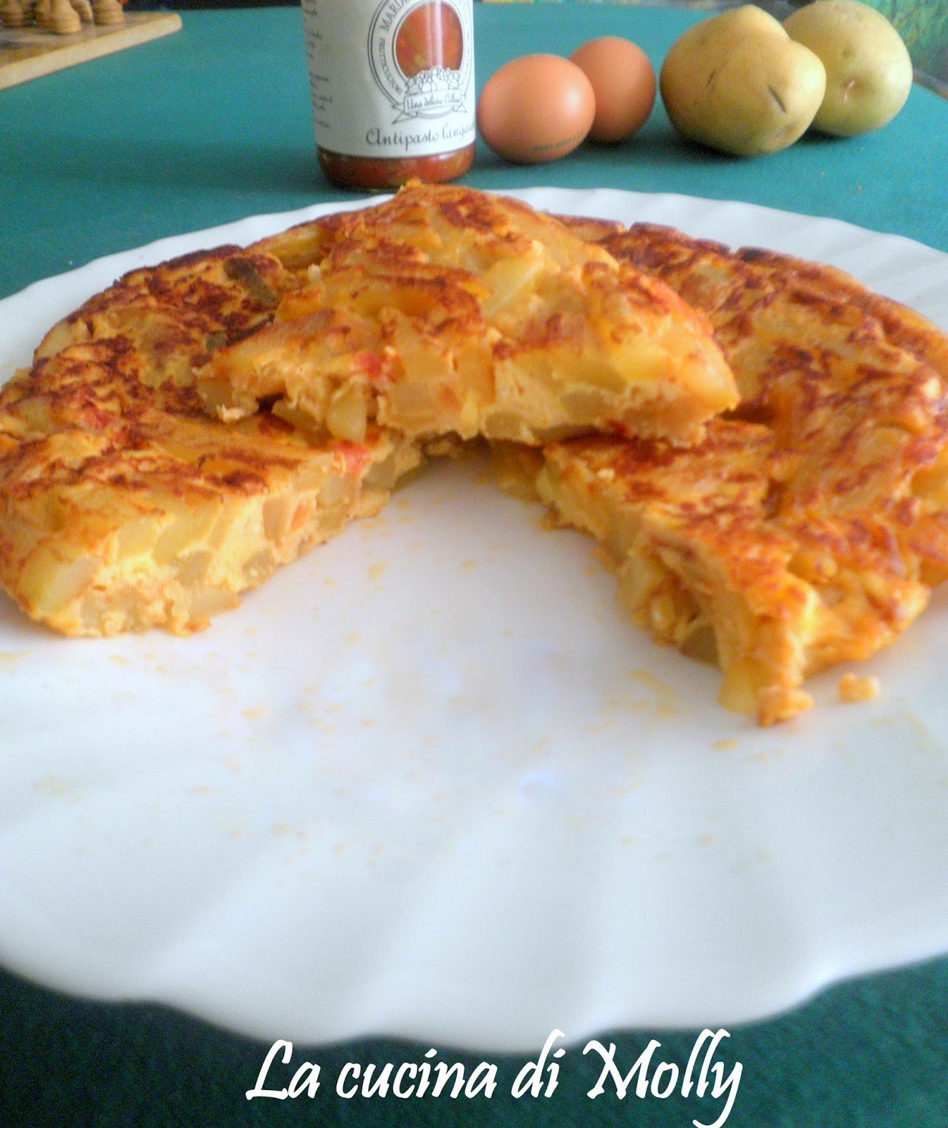 La cucina di Molly FRITTATA DI PATATE E PEPERONI SOTT'OLIO