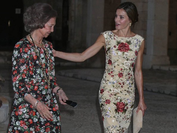 King Felipe and Queen Sofia at Almudaina Palace. Queen Letizia wore a malina print dress and Magrit shoes