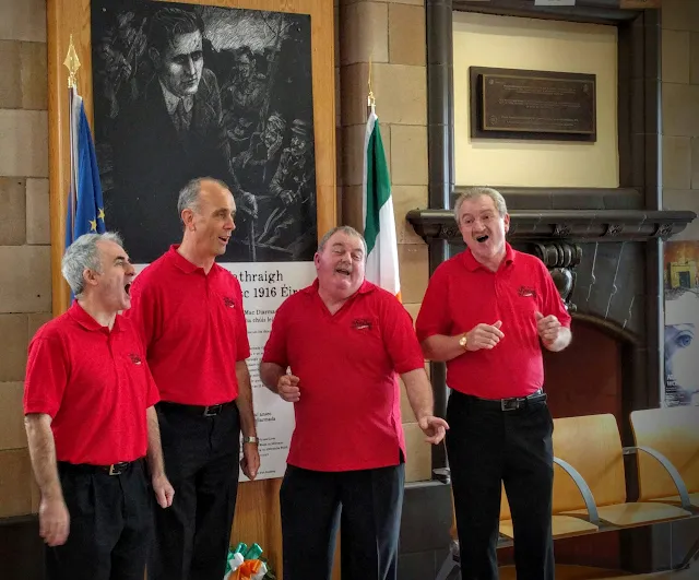 The Sandbars a cappella quartet greet the Sligo Food Train at the station in Sligo Town.