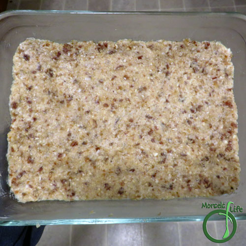 Morsels of Life - Coconut Walnut Bars Step 5 - Press firmly into a greased baking dish. Bake at 325 for 15 minutes.