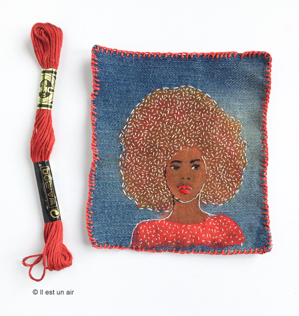 Broderie de femme sur toile de jean - portrait afro Broderie de femme sur toile de jean - portrait afro