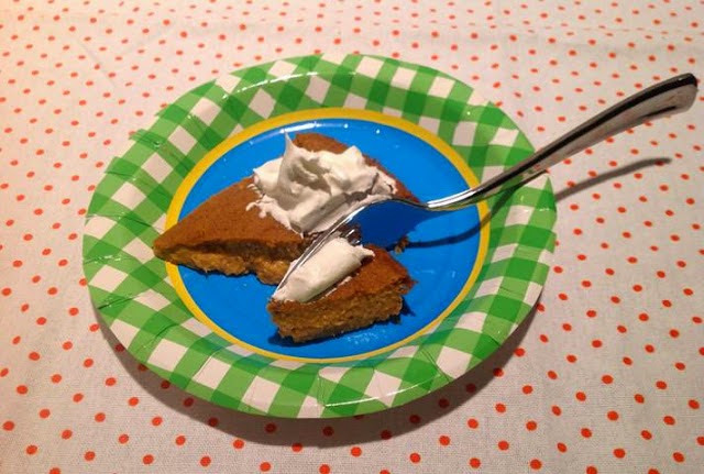 vegan pumpkin pie slice with whipped topping