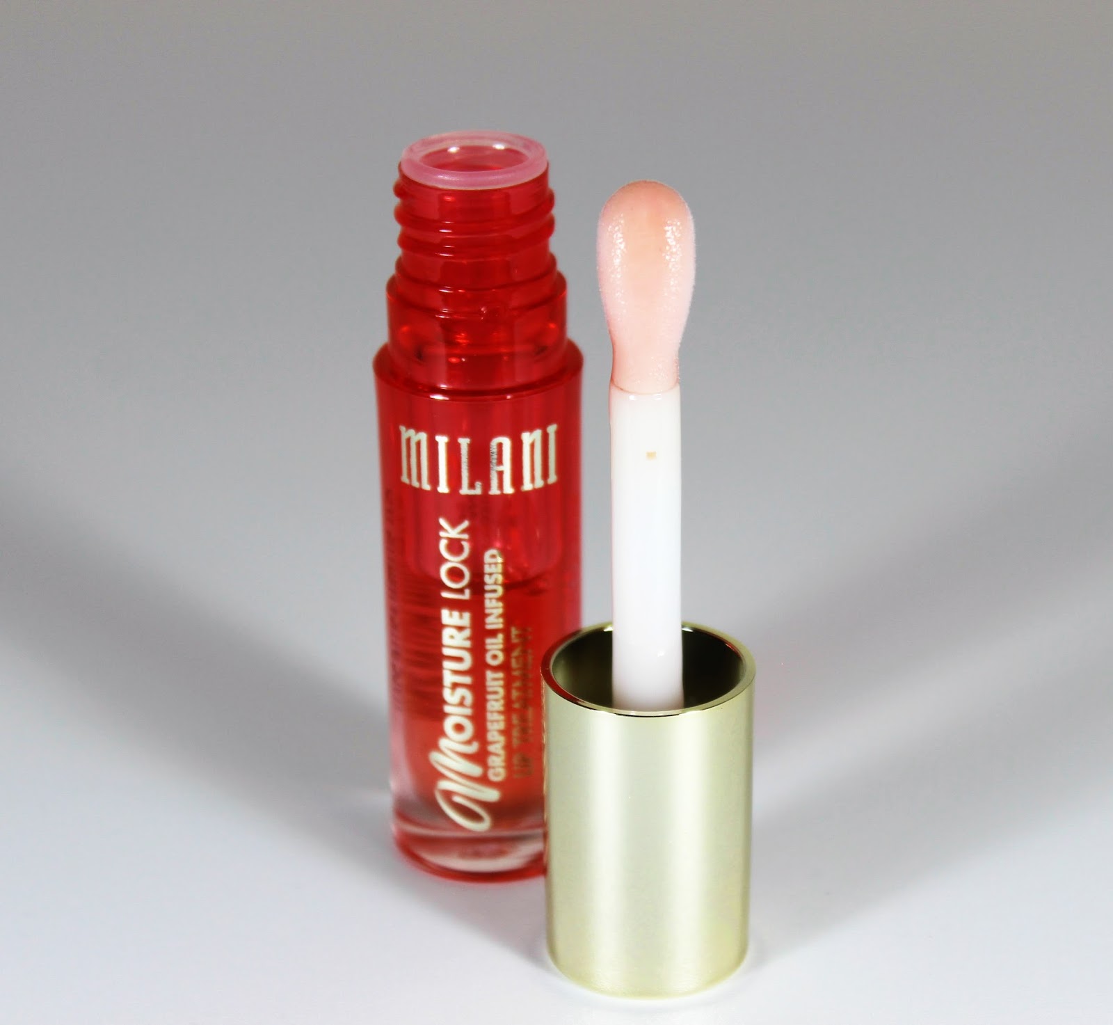 milani raspberry peach lip oil