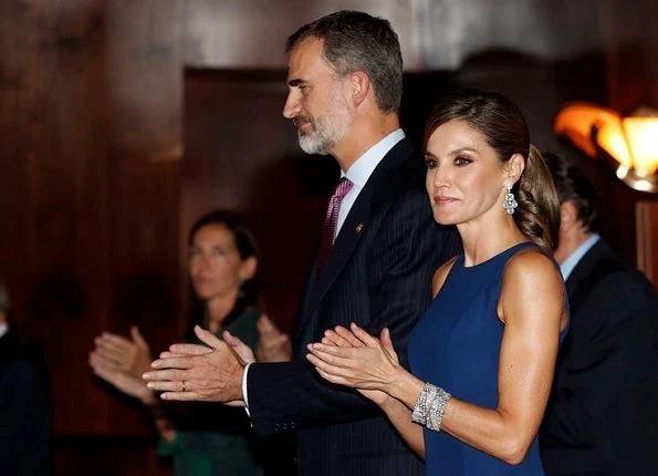 Queen Letizia Carolina Herrera top and skirt at Princess of Asturias Awards concert. white gold diamond earring