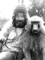 Dr Robert Sapolsky with a baboon