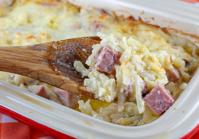 Cheesy Potatoes and Ham are so easy and delicious! You'll love the flavor from the Jarlsberg cheese and the creaminess from the sauce! Leftover ham never tasted so good!