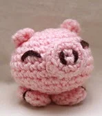 http://www.ravelry.com/patterns/library/pig-heads-or-tails
