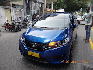 A brand new Honda taxi in which i travelled in Male' City.