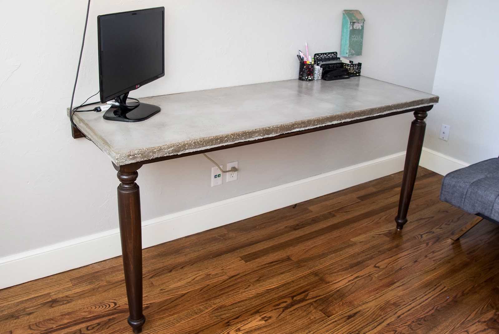 The Duffle Family Concrete Desk and Pipe Shelves Office