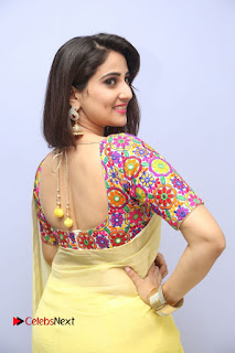 Telugu Actress Anchor Manjusha Stills in Yellow Saree at Janaki Ramudu Audio Launch  0022