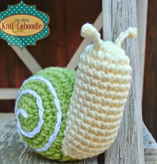 http://www.craftsy.com/pattern/crocheting/toy/fergus-the-snail/90644