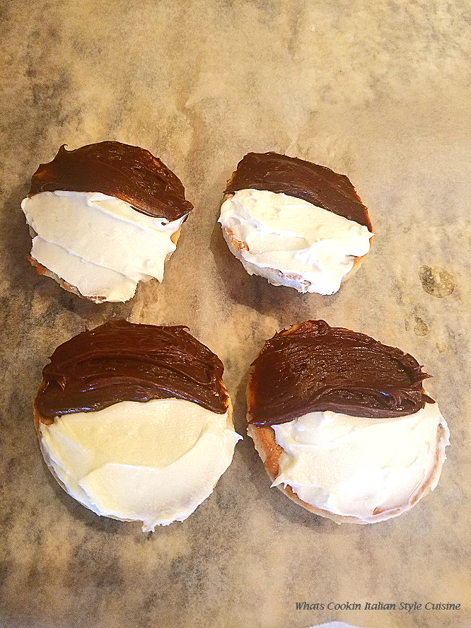 These are half moon vanilla cookies made with two kinds of frosting chocolate and vanilla frosted.