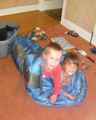 2 kids in a sleeping bag