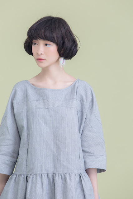 傘狀下擺造型壓紋條紋衫