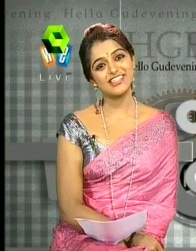 malayalam Television anchor Meera Anil hot navel and cleavage show in ...