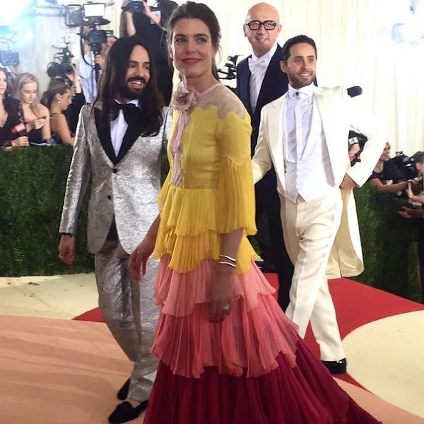 Queen Rania wore a Valentino gown. Charlotte Casiraghi wore a very colorful dress mixed with lace by designer Gucci.