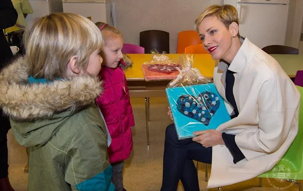 Princess Charlene of Monaco visited the nursery school of Monaco and the college 'Charles III' where the South africa children met the children of the college