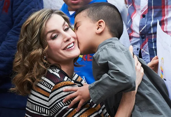 Queen Letizia of Spain attends the opening of the 11th International Seminar on Language and Journalism. Letizia wore Uterque Coat, Leather Trouser and Sandals