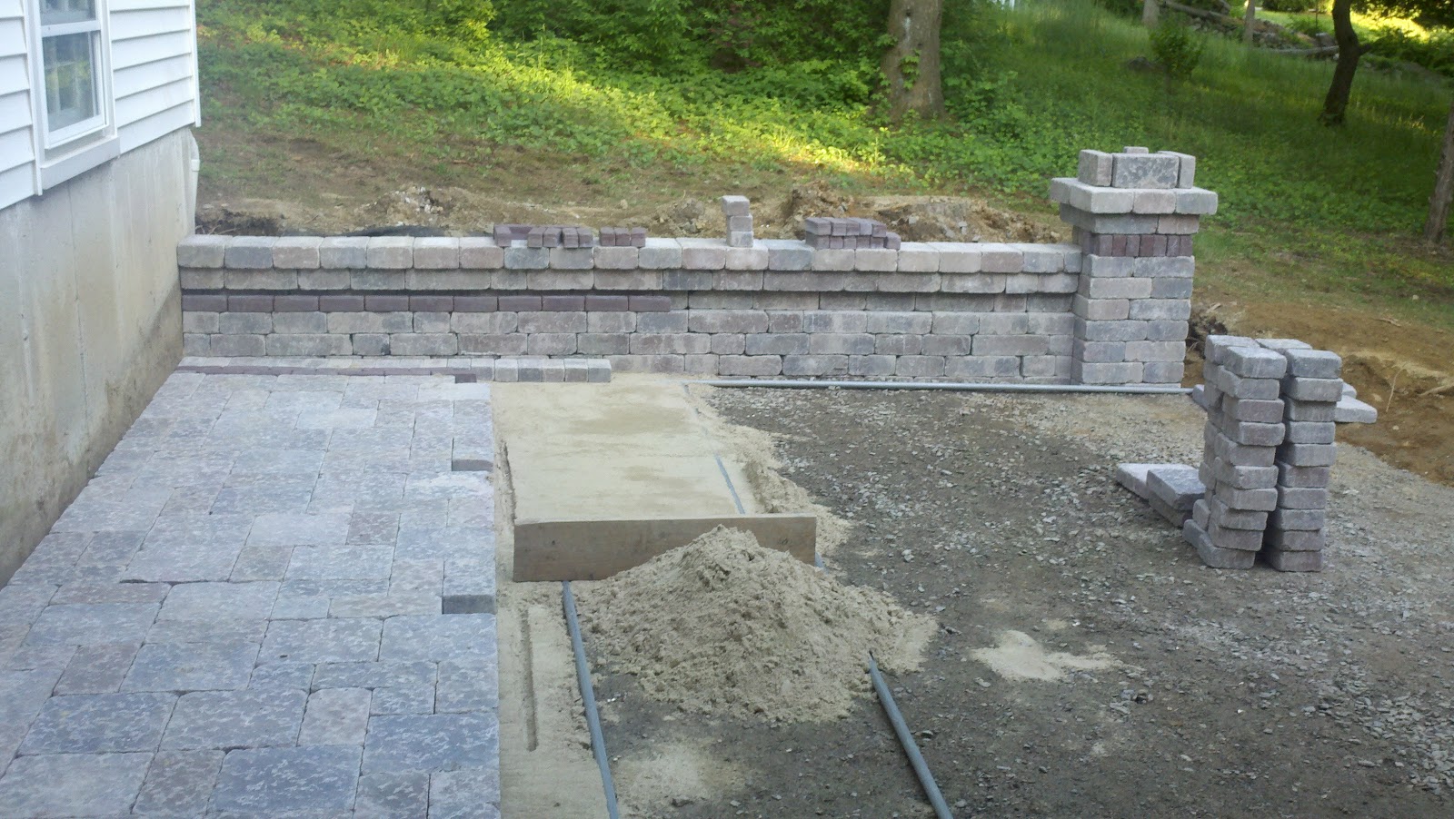 A Changing Home Transform the Yard! A Patio, Wall, Walkway Story