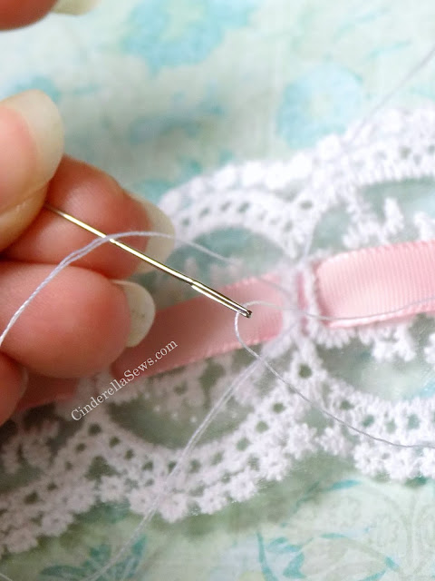 Make your own lace choker necklace for a Lolita Fashion outfit, Marie Antoinette costume, or super feminine necklace. A few stitches, pearls, crystals, and lace makes a lovely accessory for cosplay or weddings #lolita #lolitafashion #diyjewelry #sewing #beginnersewing