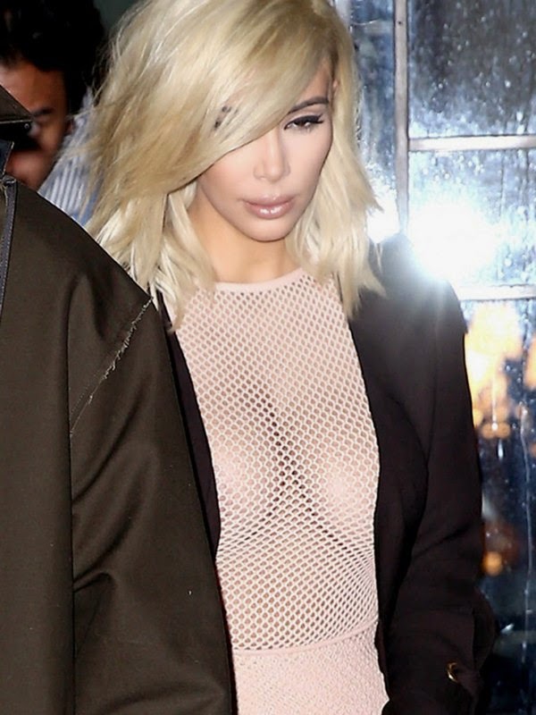 Kim Kardashian Shows Her Breasts With See Through Top