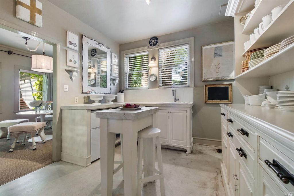 Ivy covered California home of Myra Hoefer with lush gardens and French inspired interiors