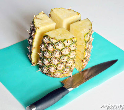 How to Cut a Pineapple Tutorial by Tricia @ SweeterThanSweets