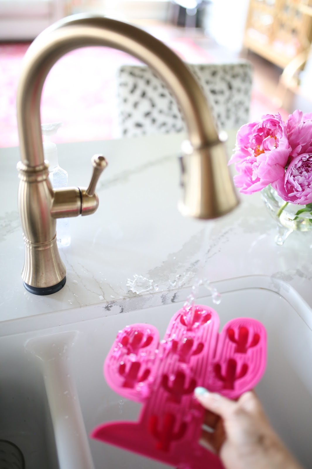 emily gemma, emily gemma blog, the sweetest thing blog, all white kitchen, gold kitchen faucet, cute ice cubes, summer, fun summer ideas, pretty kitchen, beautiful faucet, cactus, cactus ice cubes, white kitchen sink, party ideas, cambria brittanica countertops, painters, golden doodle, cactus party lights, peonies, pink peonies, pineapple, pineapple decor, pink ice cube tray, green ice cube tray, party ideas, kid activities, home decor, white kitchen