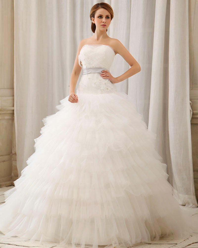 http://www.victoriasdress.co.uk/2014-new-style-ball-gown-strapless-sleeveless-tulle-white-wedding-dress-with-appliques-bukch110.html