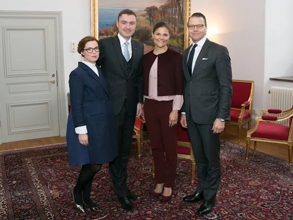 Crown Princess Victoria and Prince Daniel met with Estonia's Prime Minister Taavi Rõivas his wife Luisa Värk. Princess Victoria wore red cape