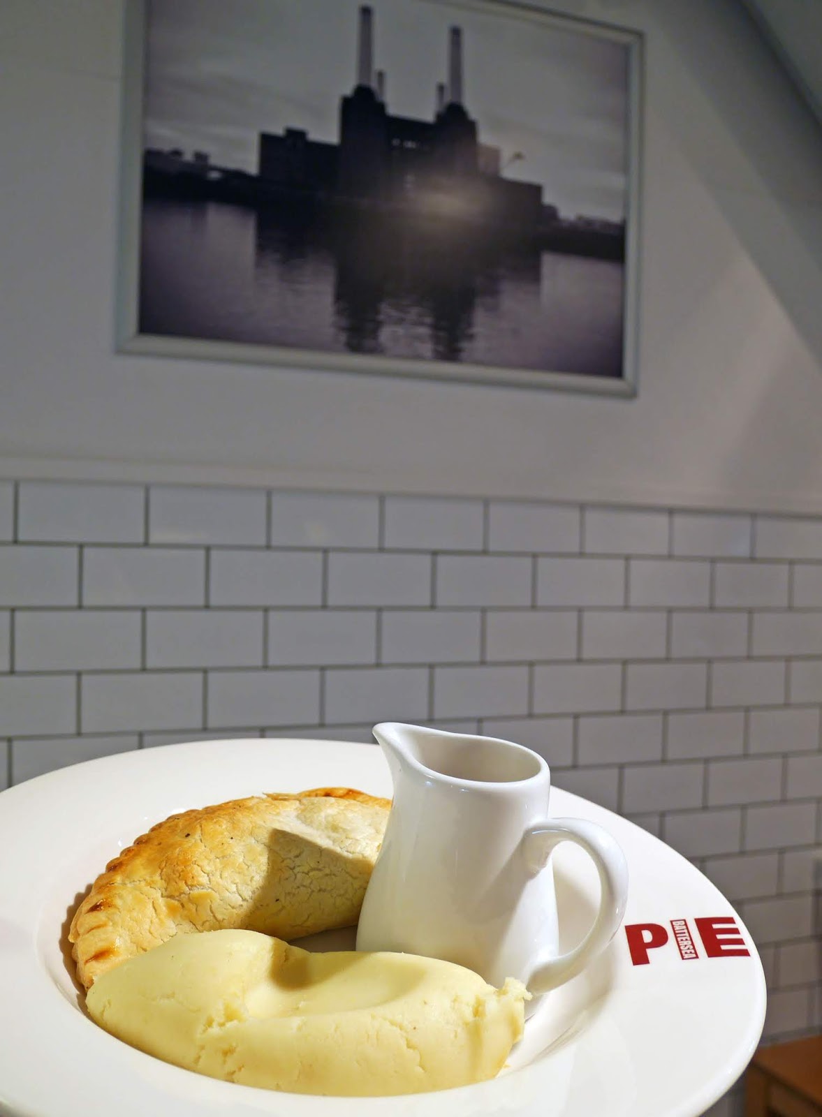 Vegetarian pasty with a side of mash potato at the Battersea Pie Station restaurant in Covent Garden, London