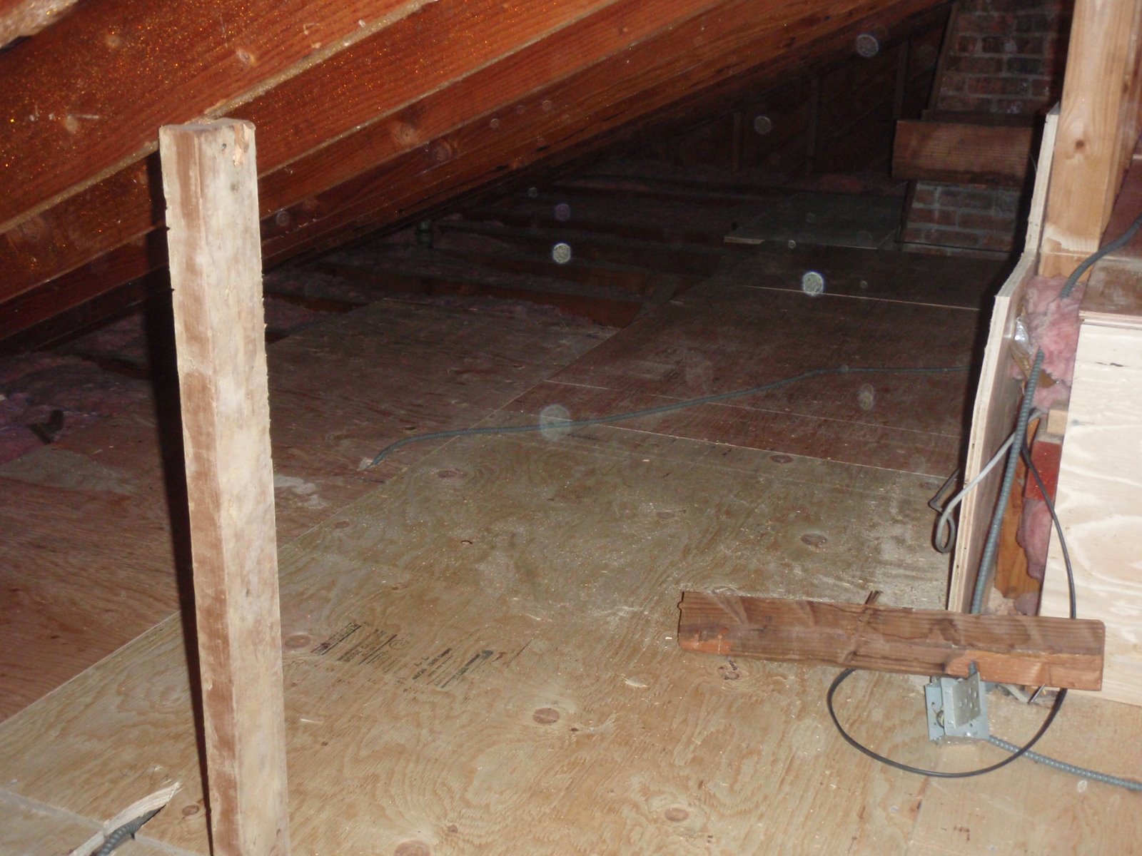 Home Pride Contracting Installing plywood in an attic