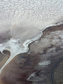 salt crystal plain and highway seen from aerial view