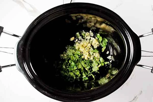 Slow Cooker Cilantro Lime Chicken ingredients in slow cooker - top view looking down