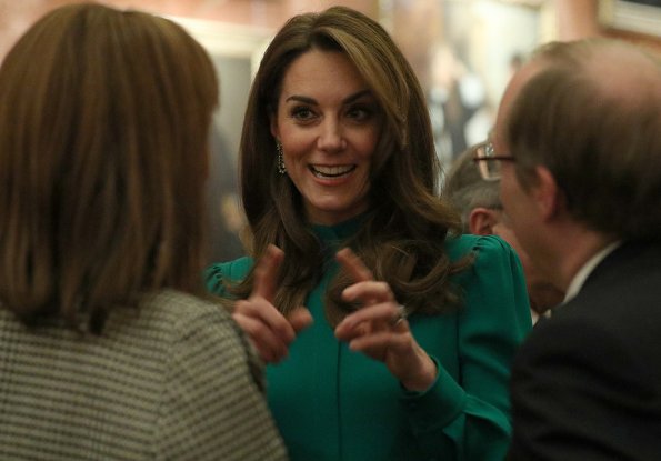 Kate Middleton wore a new emerald-green dress by Emilia Wickstead. The Duchess of Cornwall and First Lady Melania Trump