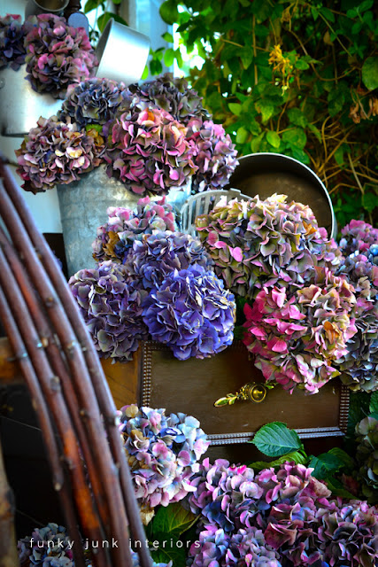 Learn how to arrange and dry hydrangeas inside a dresser... without wilting! Perfect for fall front porch decorating!