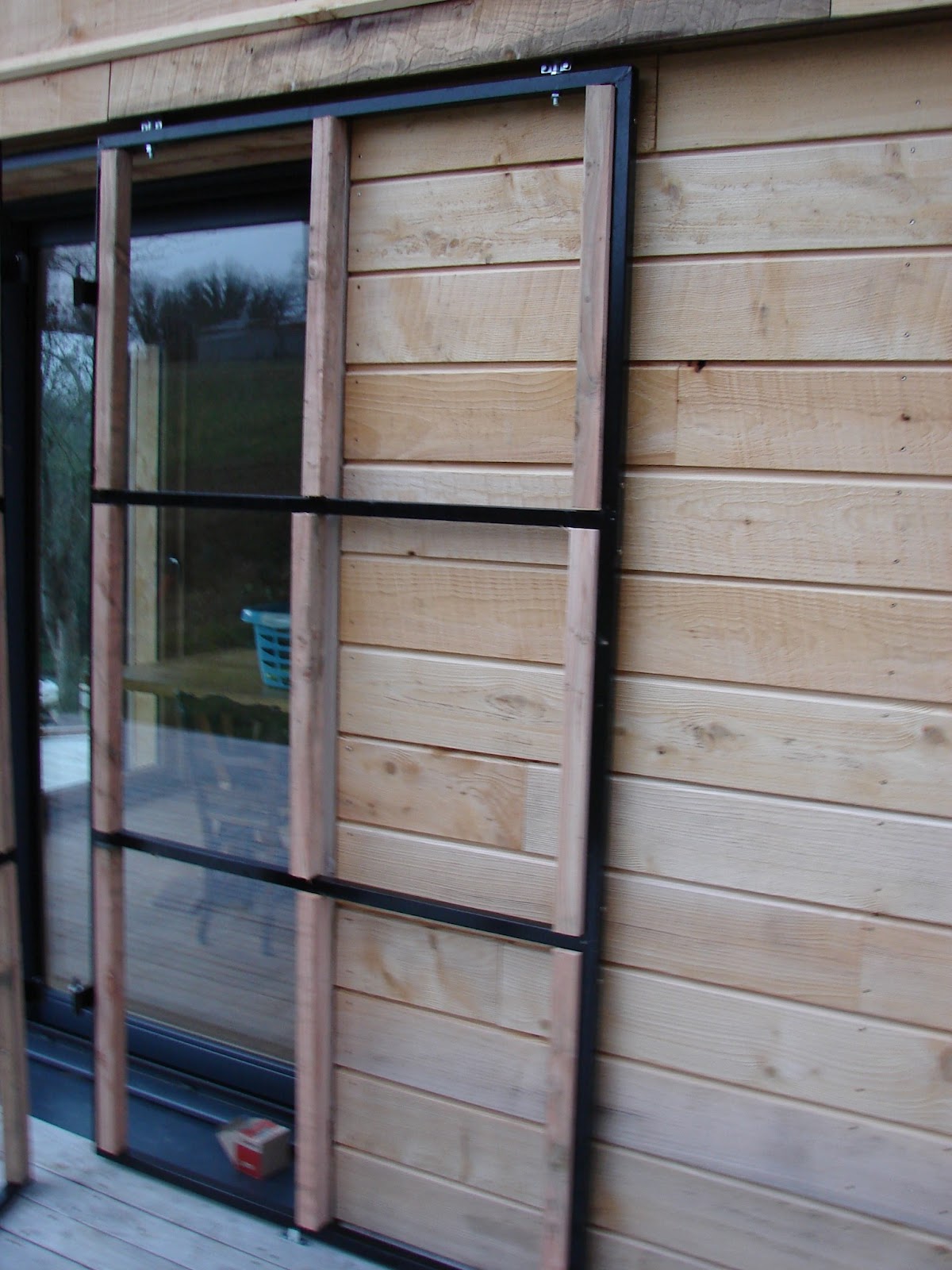 Habitat bois Volets battants coulissants en bois