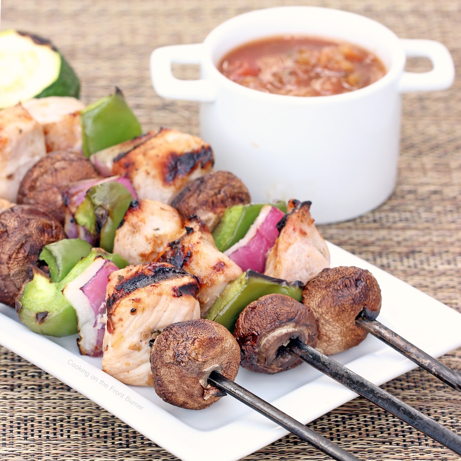 Grilled Pork Kabobs with ChileLime Sauce Cooking on the Front Burner