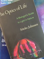 The Optics of Life: A Biologist's Guide to Light in Nature, by Sonke Johnsen, superimposed on Intermediate Physics for Medicine and Biology.