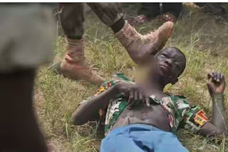 Soldier Captured stabbing Man to Death in Central Africa
