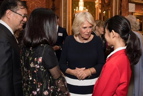 The Duchess congratulated the Commonwealth Essay Competition winners, Zahra Hussain, Ng Woon Neng, Janine Shum and Floria Gu