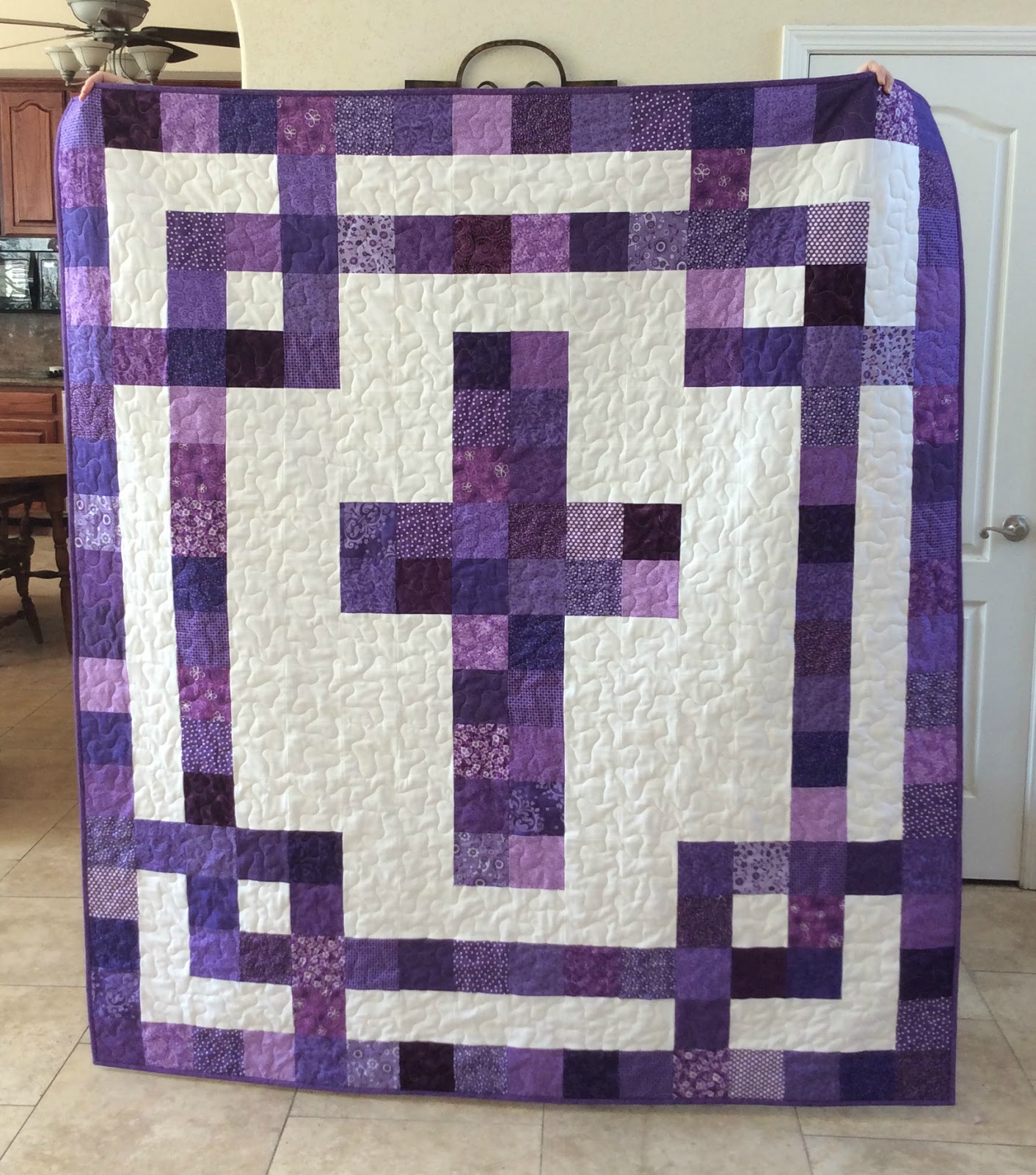 The Fleming's Nine Purple Cross Quilt
