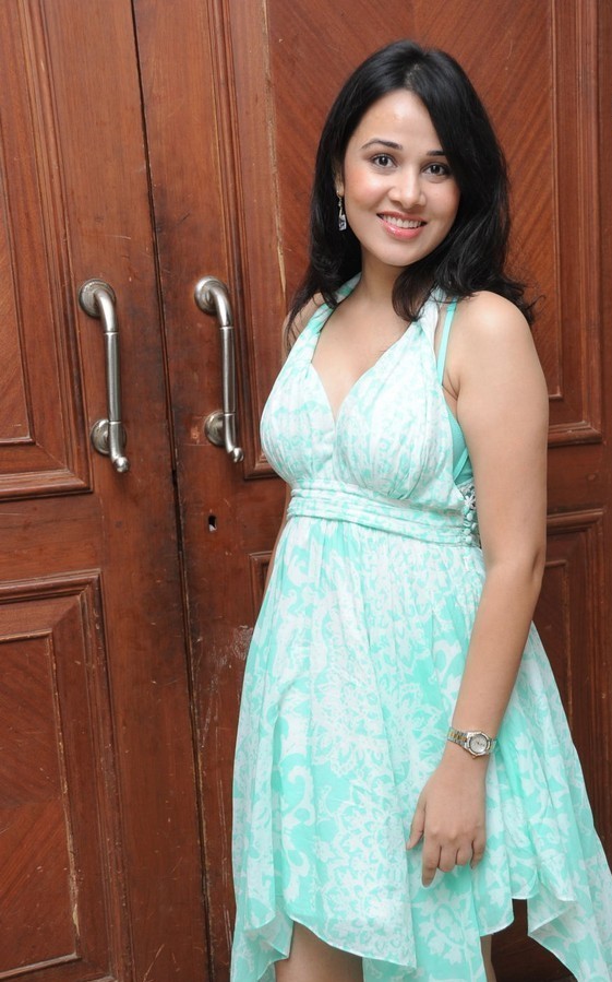 Nisha Kothari In Sleeveless Green Dress At Audio Launch