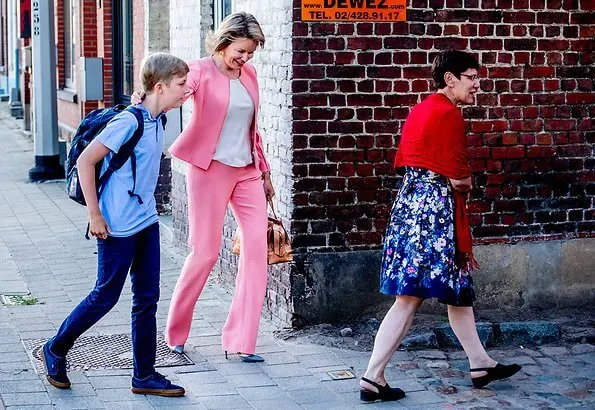 Queen Mathilde wore Giorgio Armani silk jacket and silk trousers