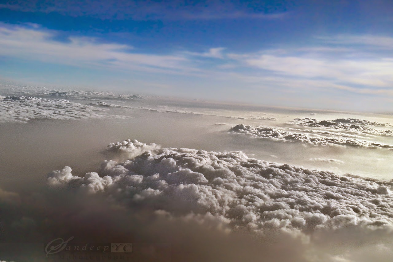 Above the Heavenly Clouds and the blue sky above, view from the Flight
