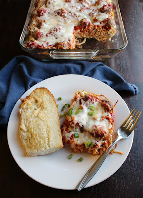 Baked spaghetti and meatball casserole is a fun twist on that classic favorite dinner. It is easier to make than lasagna and more fun too!