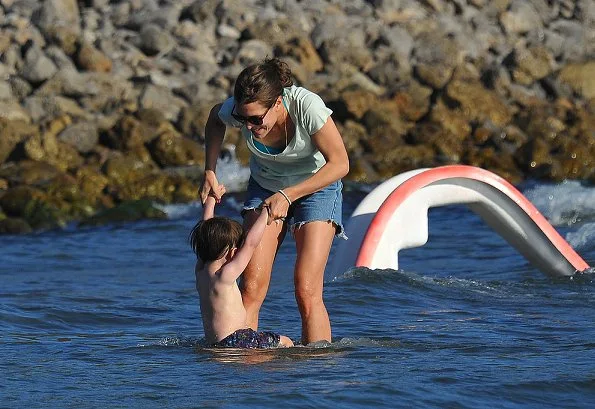 Charlotte Casiraghi and son, Raphaël Casiraghi Elmaleh on the beach in Tuscany fashion holiday